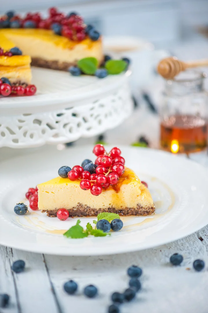 Red Strawberries and Berries on a White Surface – Food Photography Portfolio
