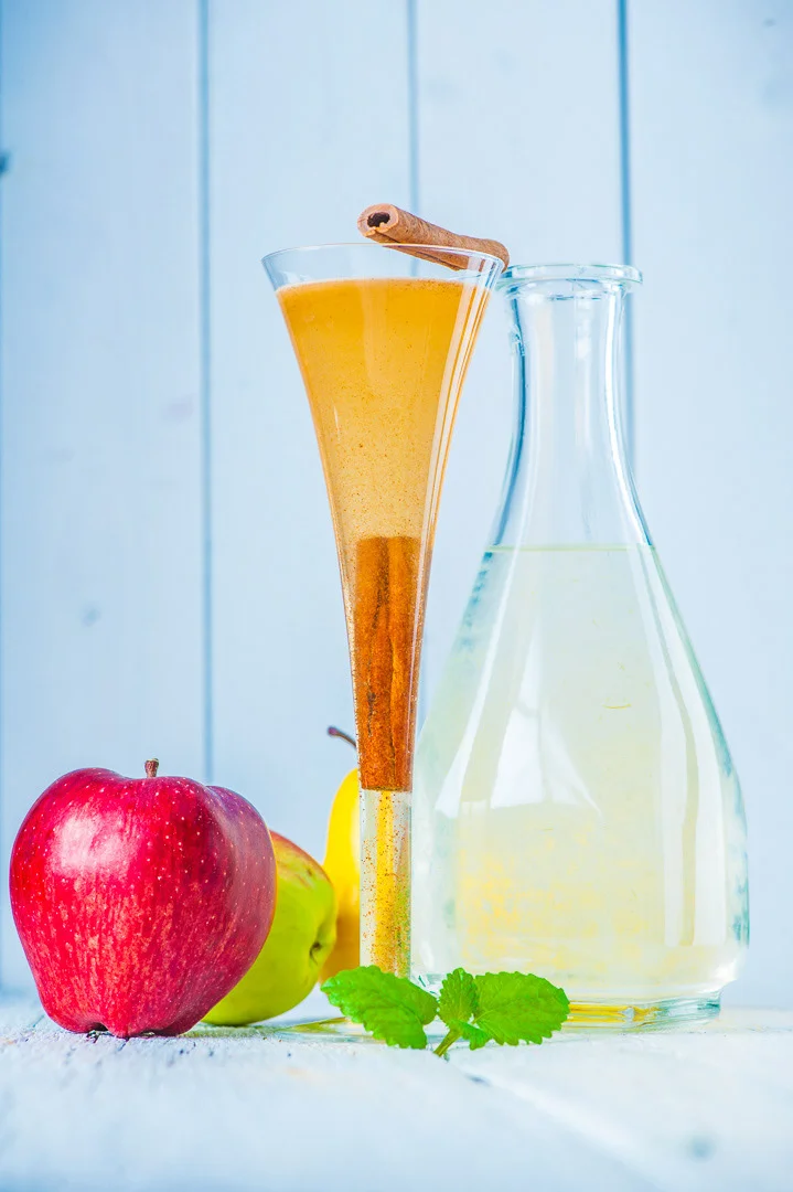 Red Apples on Green Background, Food Photography – Editorial Food Image