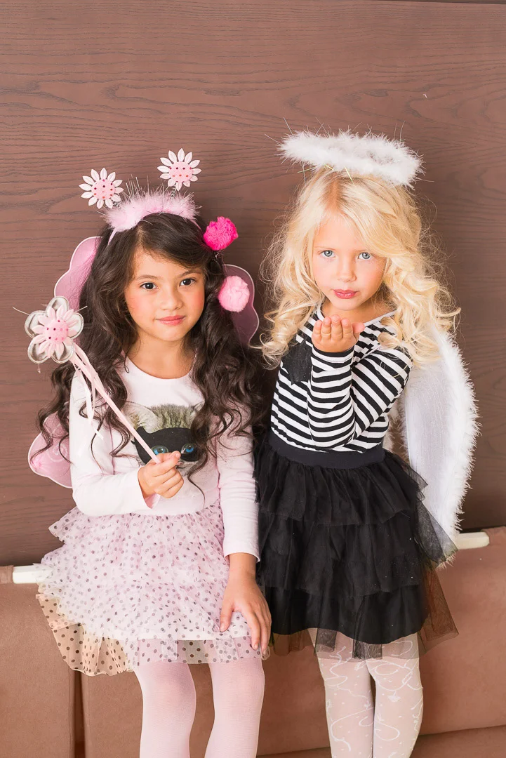 Girl in Pink Dress with White Wings – Natural Children's Photography