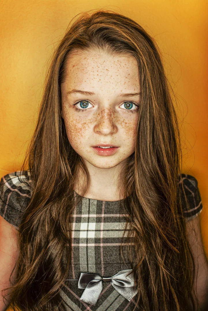 Child Portrait, Warm Tones, Candid Smile – Children's Photography